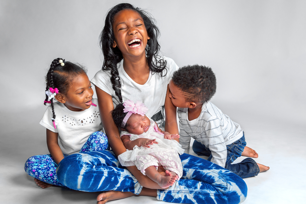 family with children laughing